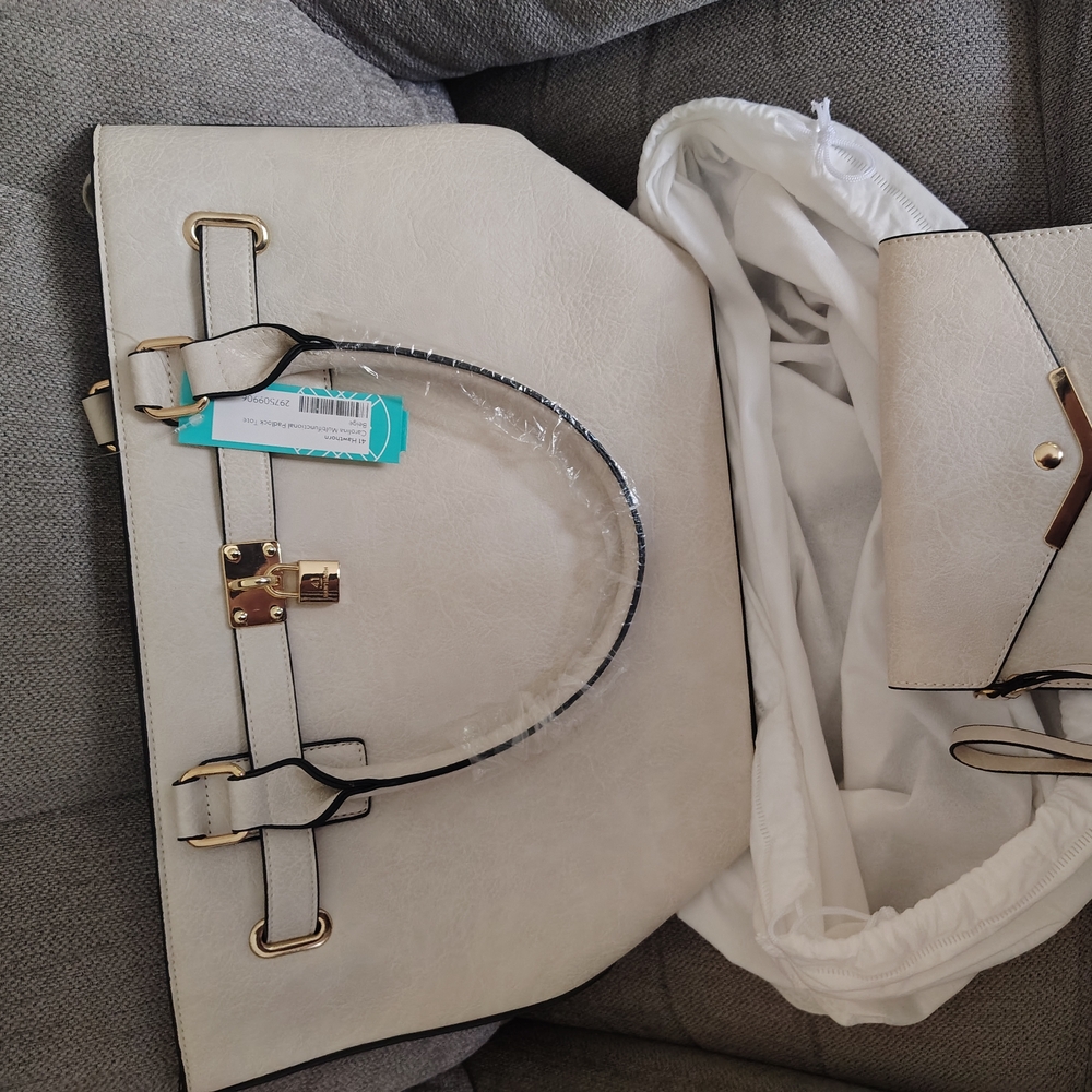 Stylish Cream Travel Bag with Gold Accents